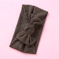 Detail of dark brown ribbed knit baby headband with a large stretch cotton bow - Army Green