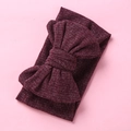 Detailed texture of burgundy ribbed knit fabric with large handmade bow for kids - Burgundy