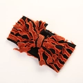 Détail du bandeau bébé avec nœud côtelé noir et volants en tulle orange plissé - 16X8cm / Orange et Noir