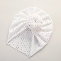 Detail view of white eyelet lace baby turban hat with decorative top donut knot - 21*19 cm / White