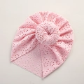 Detail of baby pink lace beanie with breathable hollow design and large bun knot - 21*19 cm / Light Pink