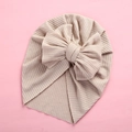 Detail of soft ribbed apricot baby turban hat with oversized stylish knot bow decoration - 18x21cm / Khaki