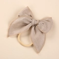Detailed texture of khaki linen bow headband with soft elastic nylon band for babies - Khaki