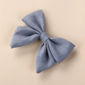 Detailed texture view of a handmade blue linen bow hair clip for young girls - 8*6.5 cm / Grey Blue