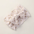 Soft nylon infant headband with floral print bow and cable knit texture in cream white - Off-white