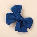 Detailed macro view of navy blue linen cotton fabric and knotted texture of the hair bow - 9x8cm / Royal Blue