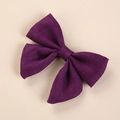 Detailed macro view of dark purple linen fabric bow hair clip for girls with rustic texture - 8*6.5 cm / Purple