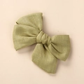 Close-up of olive green linen fabric texture on large baby bow hair clip detail - 9x8cm / Emerald Green