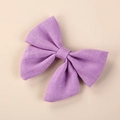 Detail shot of purple linen hair bow showing the high-quality fabric texture and craftsmanship - 8*6.5 cm / Violet