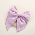 Dettaglio del fiocco in cotone jacquard rosa per neonati con fascia elastica in nylon - Viola