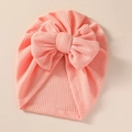 Detail showing the soft pink waffle knit texture and double bow design on a baby turban hat - 21*19 cm / Peach Yellow