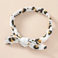 Detailed view of baby headband with leopard pattern and comfortable elastic strap - Leopard Print