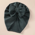 Detail of baby waffle knit hat with oversized double-layered bow in forest green color - 21*19 cm / Dark Green