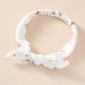 Detail of baby floral cotton headband with a knotted bow and soft elastic band - Floral