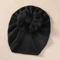 Detailed view of black knitted baby turban hat with a large textured 3D bow design - 21*19 cm / Black