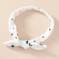 Detail of baby cotton headband with black star print and rabbit ear bow tie - Star