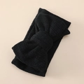 Macro view of black ribbed knit texture on soft infant headband with oversized bow - 12# Black