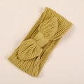 Détail du bandeau en nylon tricoté jaune moutarde avec un grand nœud pour bébés - Jaune Gingembre