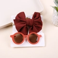 Detail of burgundy bow nylon headband and red round sunglasses set for infants - Card Packaged Set / Orange Red Set