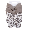 Detail of four-piece cotton bow hair clips with solid brown and leopard prints on a card - Set 10 (FHML-2251)