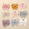 Selection of nine colorful cotton bow hair clips in pastel tones with ribbed texture - 10.5x10.5cm / Random Color
