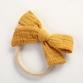 Diadema de algodón muselina amarillo jengibre con lazo doble y nailon para bebés - Amarillo jengibre