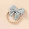 Soft cotton baby headband with light greyish-blue oversized bow and nylon band - Bean Green