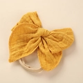 Details zur Baby-Haarband mit Baumwollschleife in Senfgelb und elastischem Nylonband - 10.5x10.5cm / Kurkuma