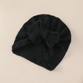 Detalle del turbante para bebé con textura acanalada y un gran lazo decorativo - Negro
