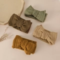 Detail view of four ribbed knit baby headbands in olive, coffee, khaki and ginger colors - 17*8cm / Random Color