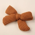 Detail of knitted caramel brown bow hair clip showing textured wool yarn and weave pattern - 9*6CM / Dark Coffee