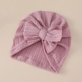 Detailed knit texture of pink baby turban hat with a large decorative bow - Light Purple