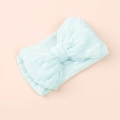 Detail of light blue baby bow headband with textured knitted fabric on a pink background - Light Blue