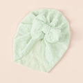 Detail of mint green baby turban hat with double lace bow and jacquard fabric texture - Pale Green