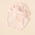 Detail view of baby turban hat with oversized mesh bow and soft lace texture - Light Pink