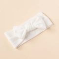 Detail of white ribbed knit baby headband with a large soft decorative bow - White Style (#6)