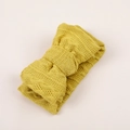 Mustard yellow knitted baby headband featuring a double-layered bow with texture - Turmeric