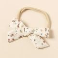 Fascia per neonata con fiocco a fiori rossi e gialli su morbido nylon elastico - Bianco Floreale