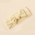 Detail of soft ribbed knit baby headband with a large layered bow in beige - Light Beige Yellow Style (#12)