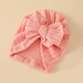 Gorro turbante rosa de punto acanalado para bebés con un gran lazo decorativo - Rosa Melocotón