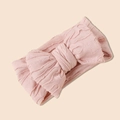 Dettaglio della fascia per neonati in maglia jacquard rosa con un grande fiocco - Rosa Pelle Chiaro / 17*8.5cm