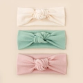 Three-piece set of elastic ribbed knot headbands for babies in cream, green, and pink colors - Random One
