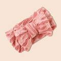 Gros plan sur un bandeau bébé rose avec un double nœud texturé et un tissu tricoté élastique - Rose Foncé / 17*8.5cm