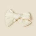 Detailed macro view showing the cream-colored woven texture and fabric bow on hair clip - 8.5*6.5CM / Cream