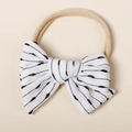 Close-up of soft nylon baby headband with white striped bow and delicate embroidery texture - 8.5*6.5CM / White