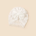 Close-up of white lace turban beanie for babies with a large decorative bow - 20*17cm / White