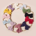 Detailed circle layout showing 11 pieces of soft nylon baby headbands with striped bows - 8.5*6.5CM / Random One