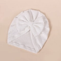Detailed view of white baby turban with textured bubble fabric and large bow decoration - 17*18.5cm / White