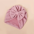 Detailed view of pink knitted baby turban hat with oversized bow and ribbed texture - 17*18.5cm / Pink