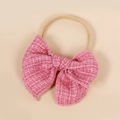 Close-up of pink tweed bow on soft nylon infant headband showing high elasticity fabric - 10.5*10.5cm / Peach Pink